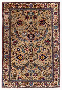 A semi-antique Tabriz of  'Sickle-Leaf' design, c 240 x 161 cm.