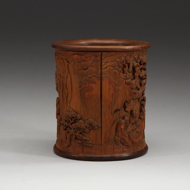 A carved bamboo brush pot, presumably late Qing dynasty (1644-1912).