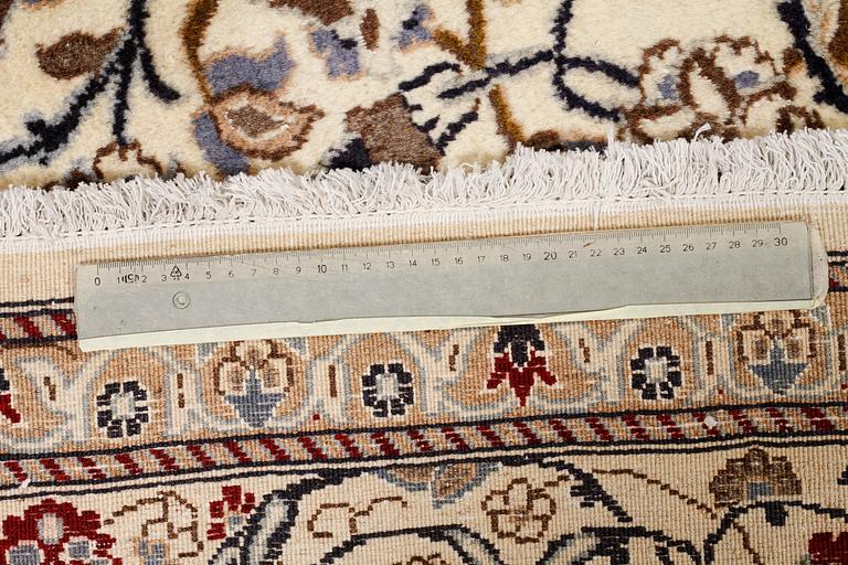 A CARPET, Nain, part silk, around 340 x 241 cm.