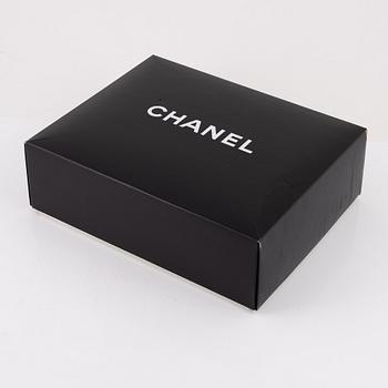 Chanel, a black caviar leather bag, 1997-1999.