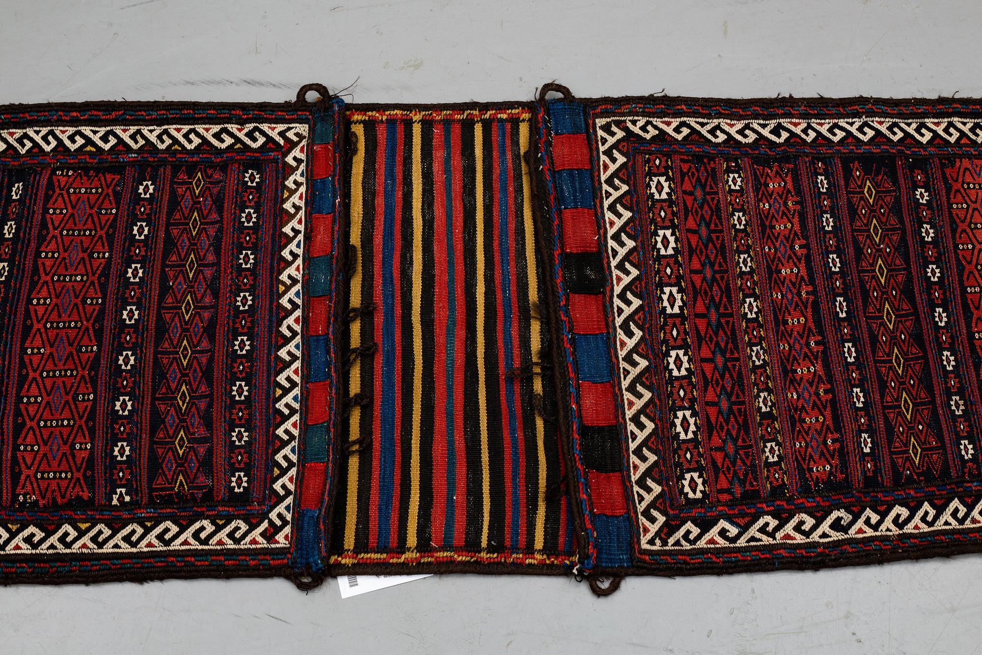A baluch saddelbag, circa 154 x 63 cm.