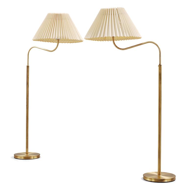 Josef Frank, a pair of brass floor lights, Svenskt Tenn, Sweden.