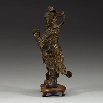 A gilt bronze figure of a Lokapala, Ming dynasty (1368-1644).