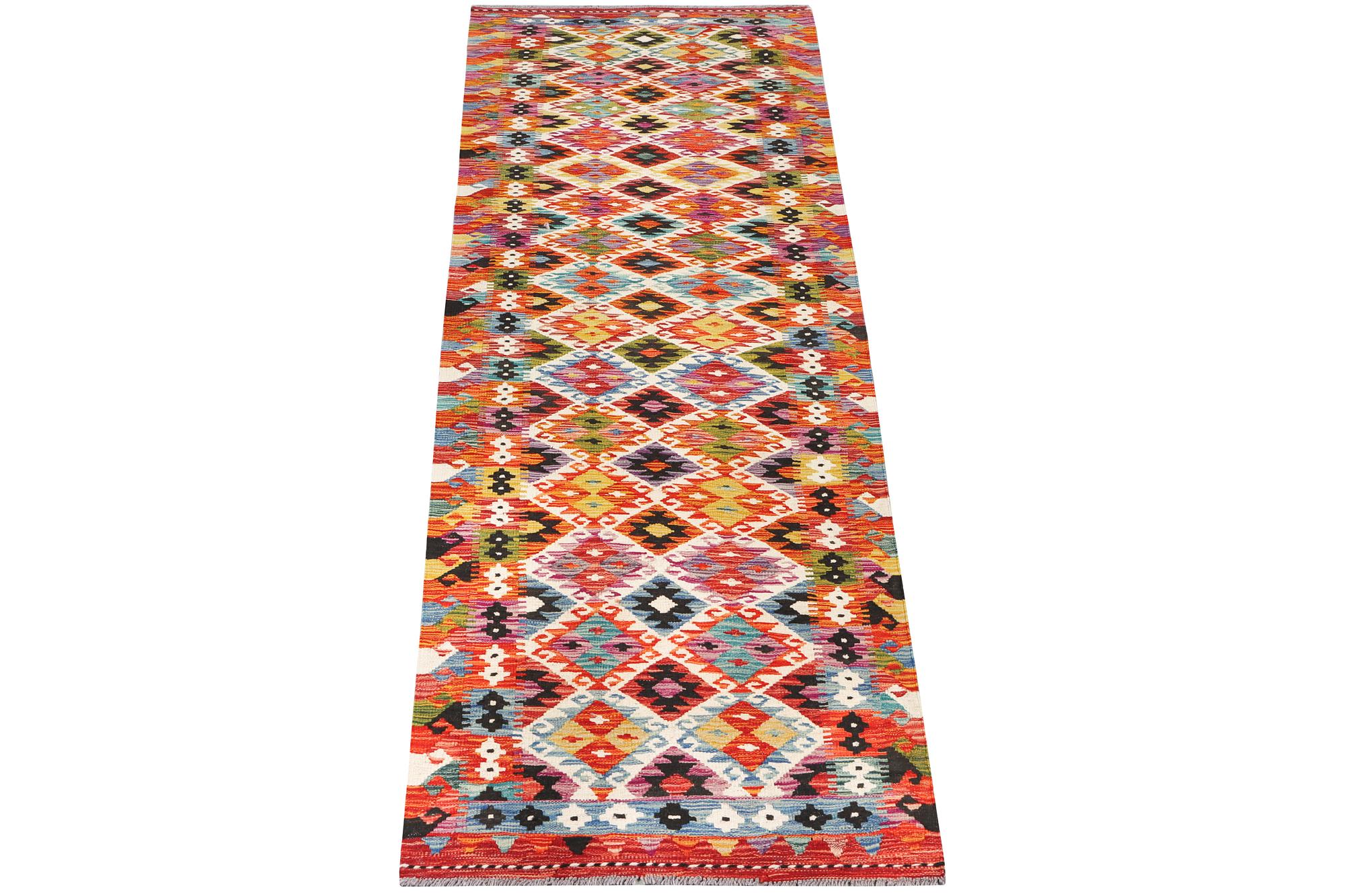 A Kilim runner carpet, c. 298 x 80 cm.