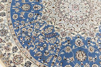 A round part silk Nain rug, so called 9 LAA, diameter 195 cm.
