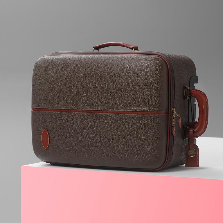 A hardsided trolley by Mulberry.