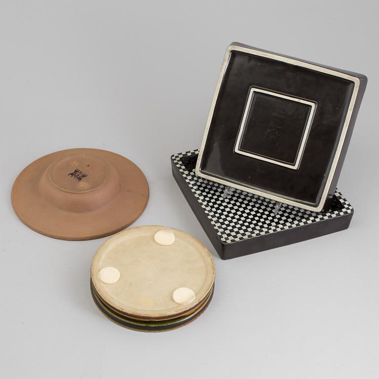 Four mid 20th century dishes by Stig Lindberg for Gustavsberg, two 'Domino', one 'Silur' and one signed.