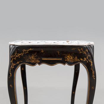 A Swedish Rococo faience tea table, Marieberg 1770.