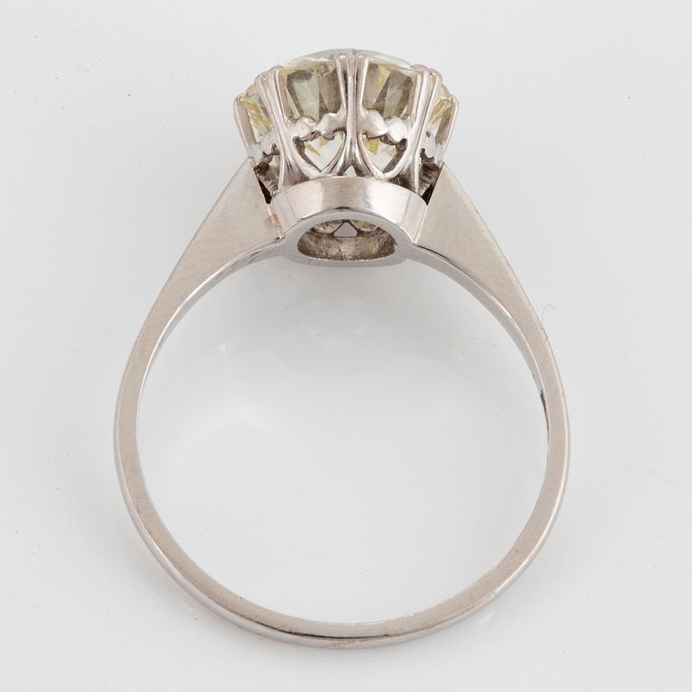 A platinum ring set with an old-cut diamond 3.50 cts according to engraving.