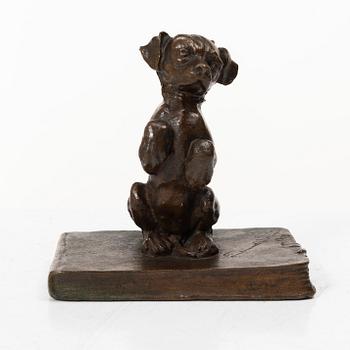 Ferdinand Notini, a bronze sculpture/paper weight, signed, 1908.