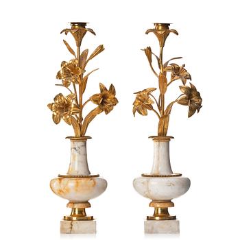 132. A pair of Louise Philippe candlesticks.