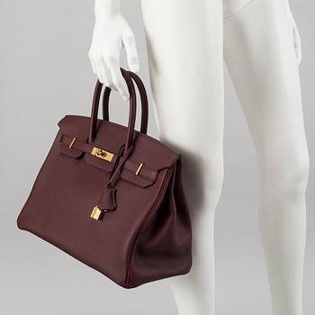 A Birkin 35 by Hermès Bordeaux, 2017.