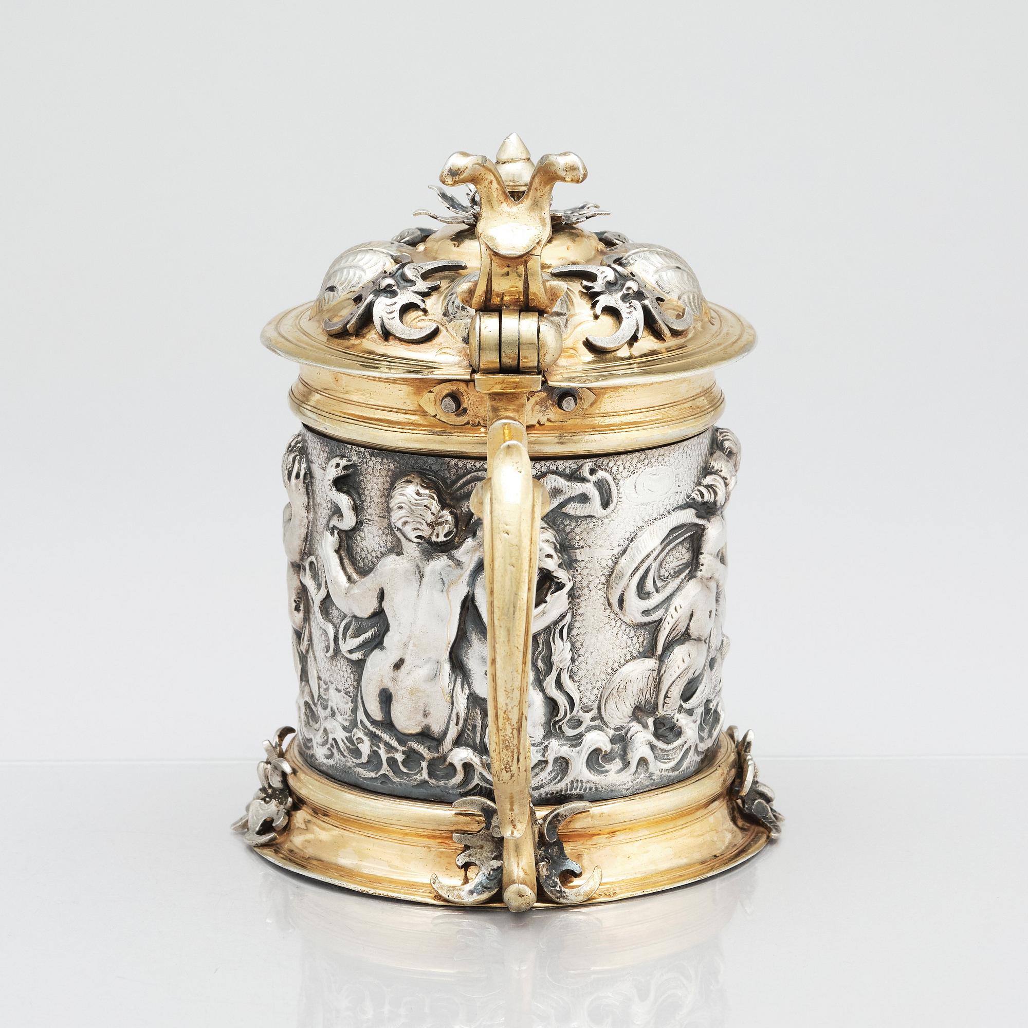 A German 17th century parcel-gilt silver tankard, mark of David Schwestermüller I, Augsburg 1634-1635.