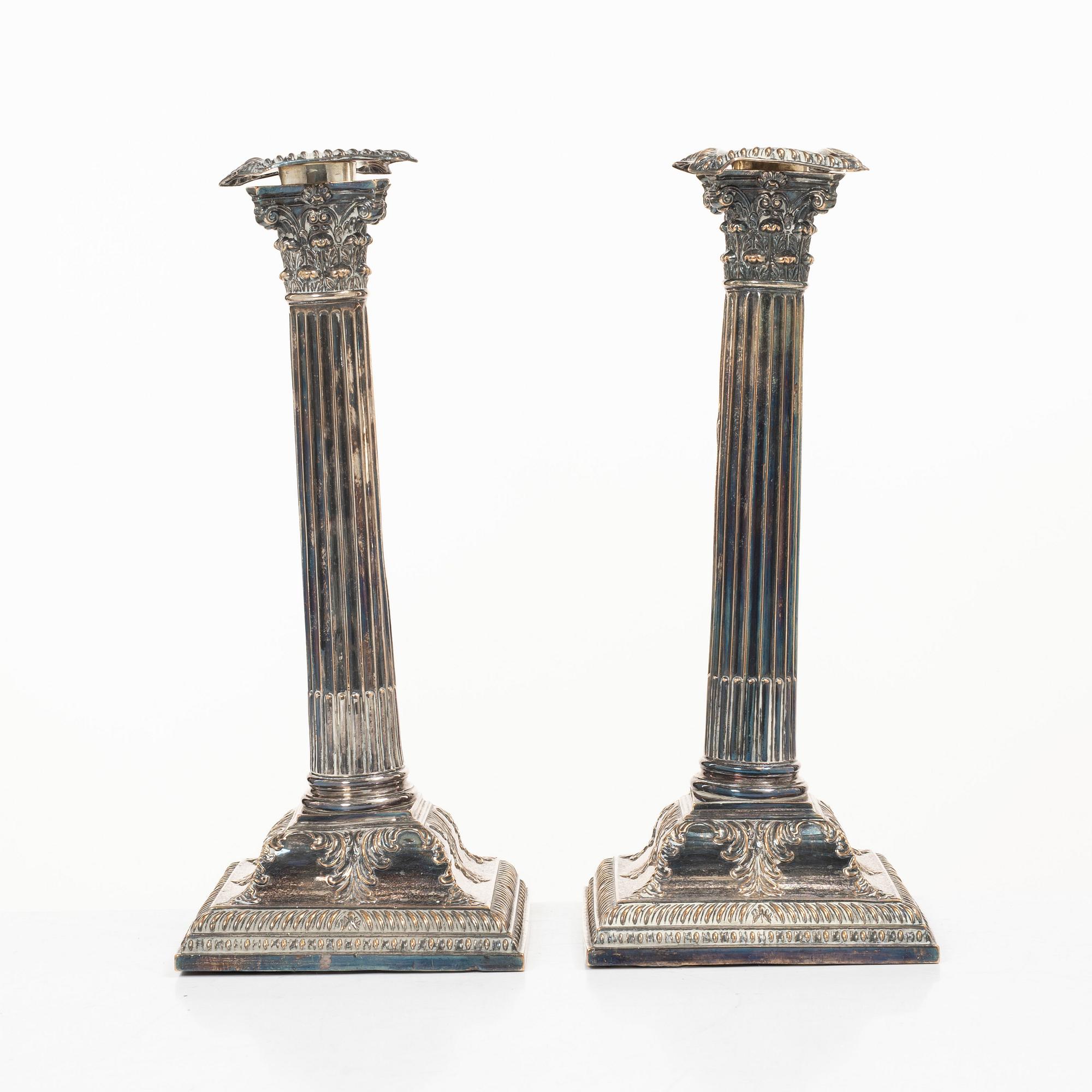 A pair of silver plate candlesticks, no marks, 20th century.