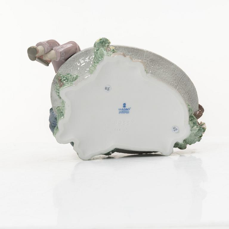 Lladró, three figurines,"Girl with French bulldog", "Girl with Dalmatians" and "Petals in the pond", Spain.