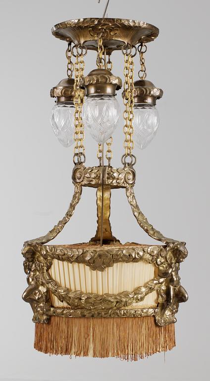 An Art Nouveau patinated brass hanging lamp, by Böhlmarks, Stockholm 1910's-20's.