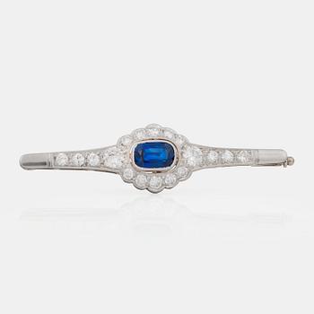 1163. A sapphire and brilliant-cut diamond brooch.