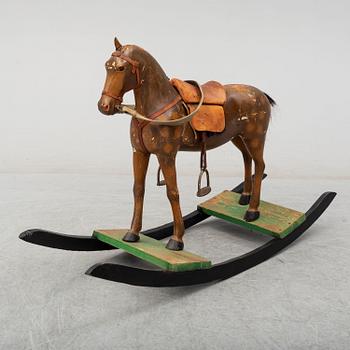 A first half of the 20th century wooden rocking horse.