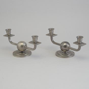 GAB, a pair of pewter candelabra, 1936-7.