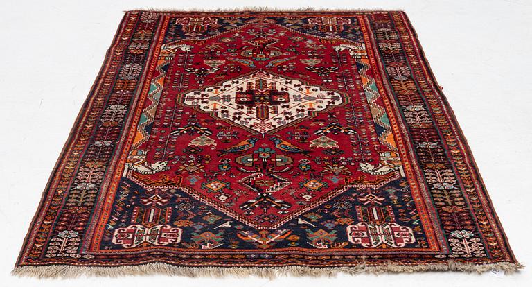 An oriental rug, c. 218 x 133 cm.