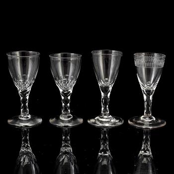 FOUR WINE GLASSES, late 18th or early 19th century.