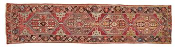 178. A RUNNER, an antique Anatolian, ca 425 x 101-107 cm (as well as 2,5 cm light green flat weave at one end).