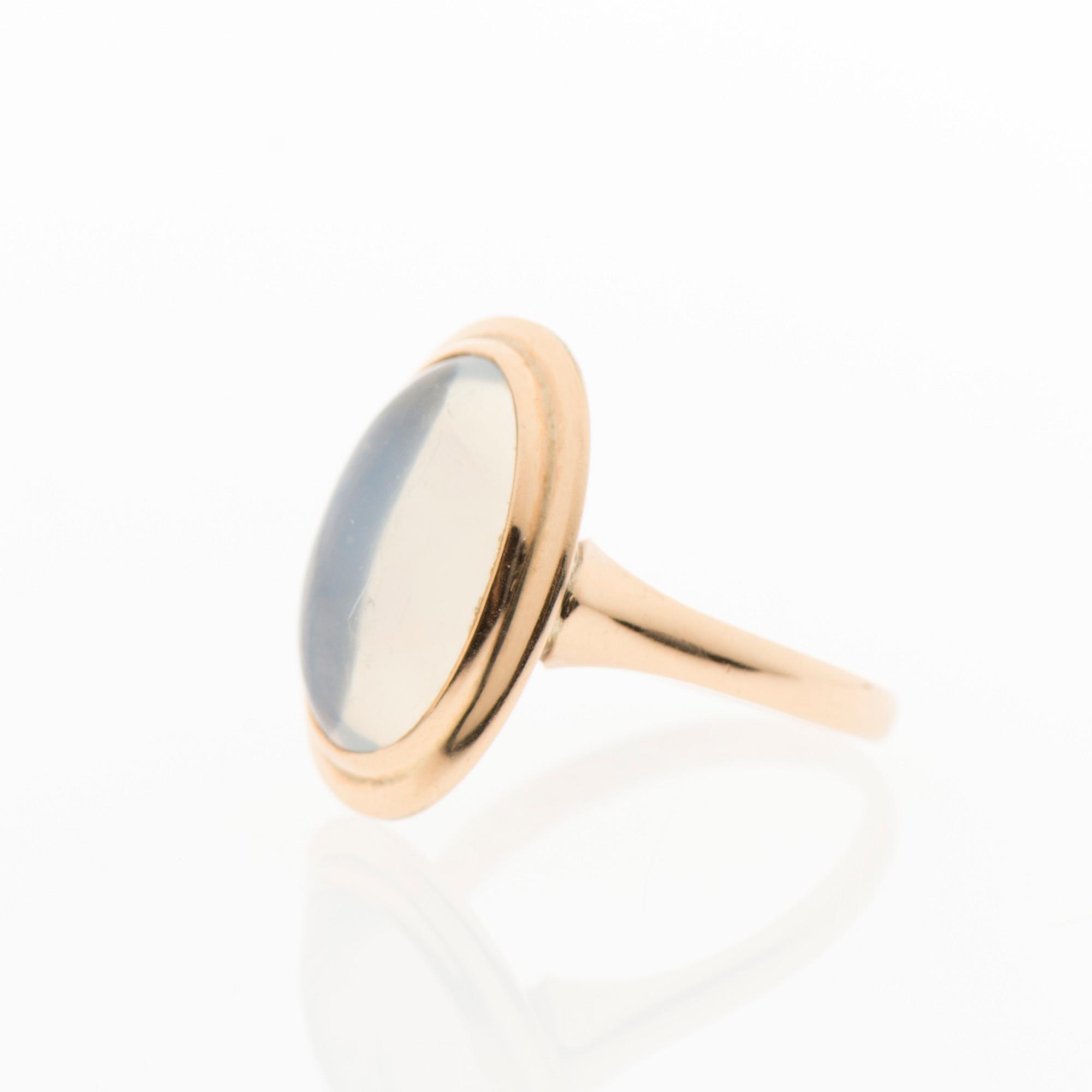 SORMUS, pyöröhiottu kuukivi, kultaa. Korutuote, Heinola Finland 1958.