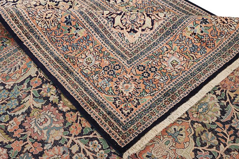 A Kashmir carpet, silk, c. 333 x 234 cm.