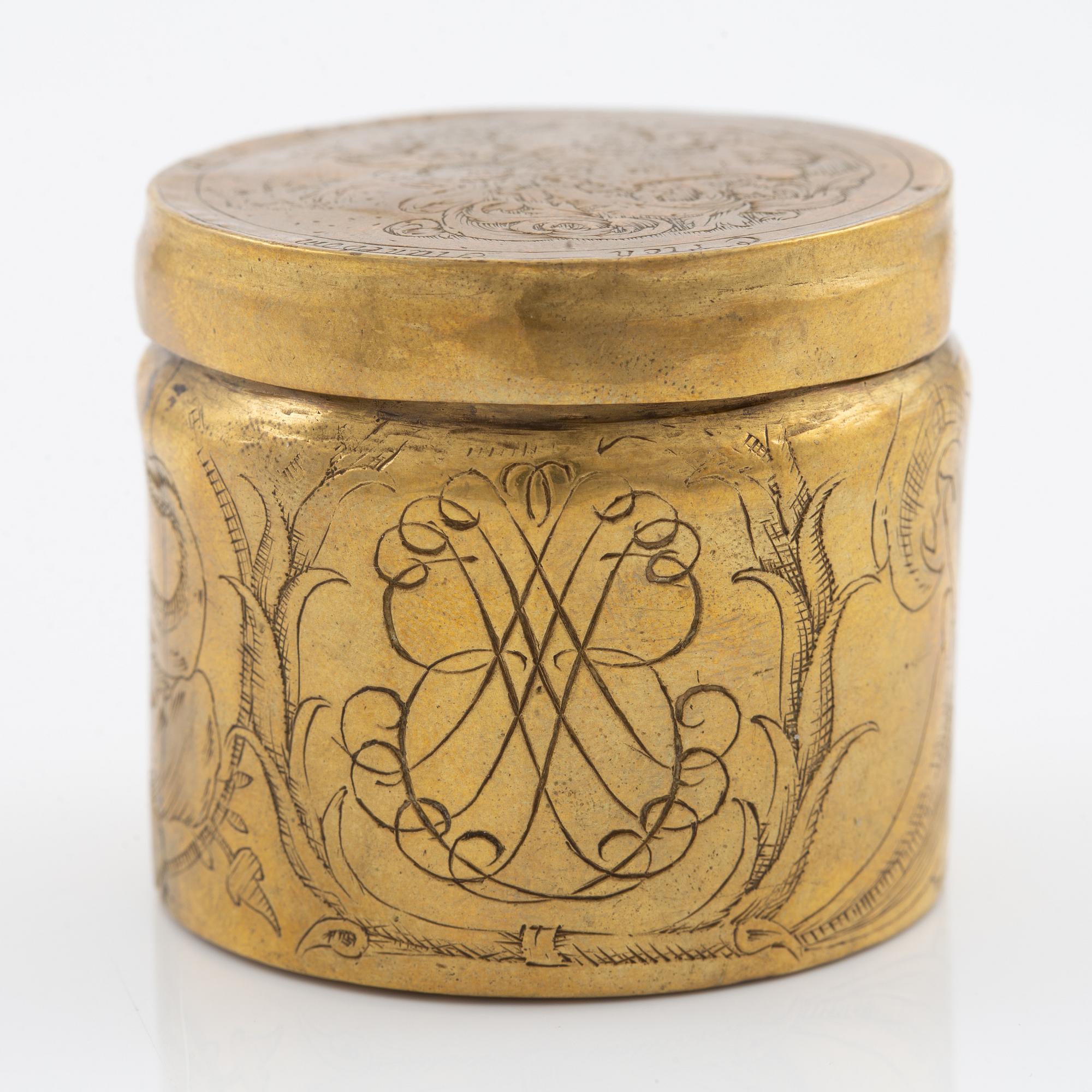 A presumably German baroque brass box, dated 1686.