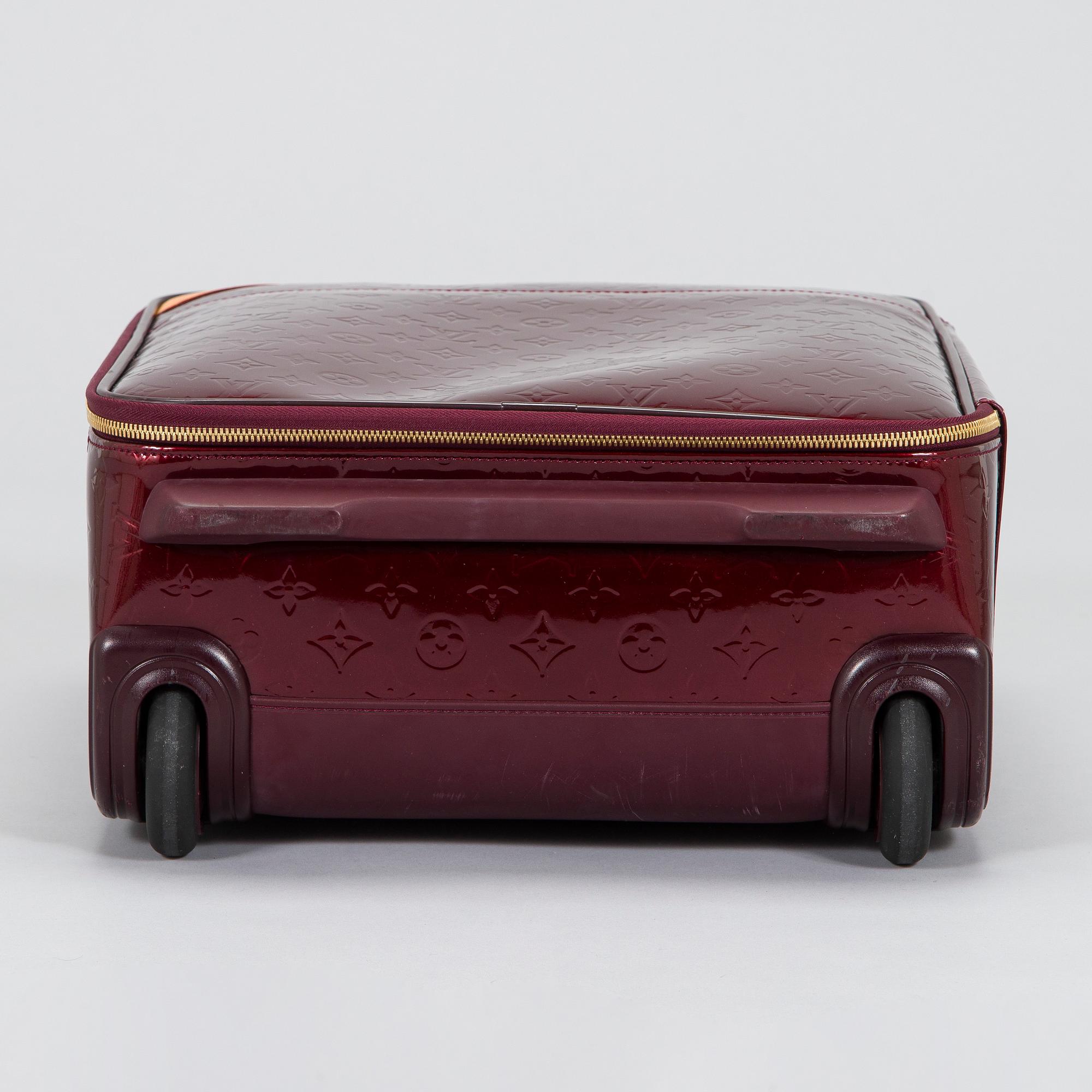 Louis Vuitton, a Monogram Vernis 'Pégase 45', suitcase.
