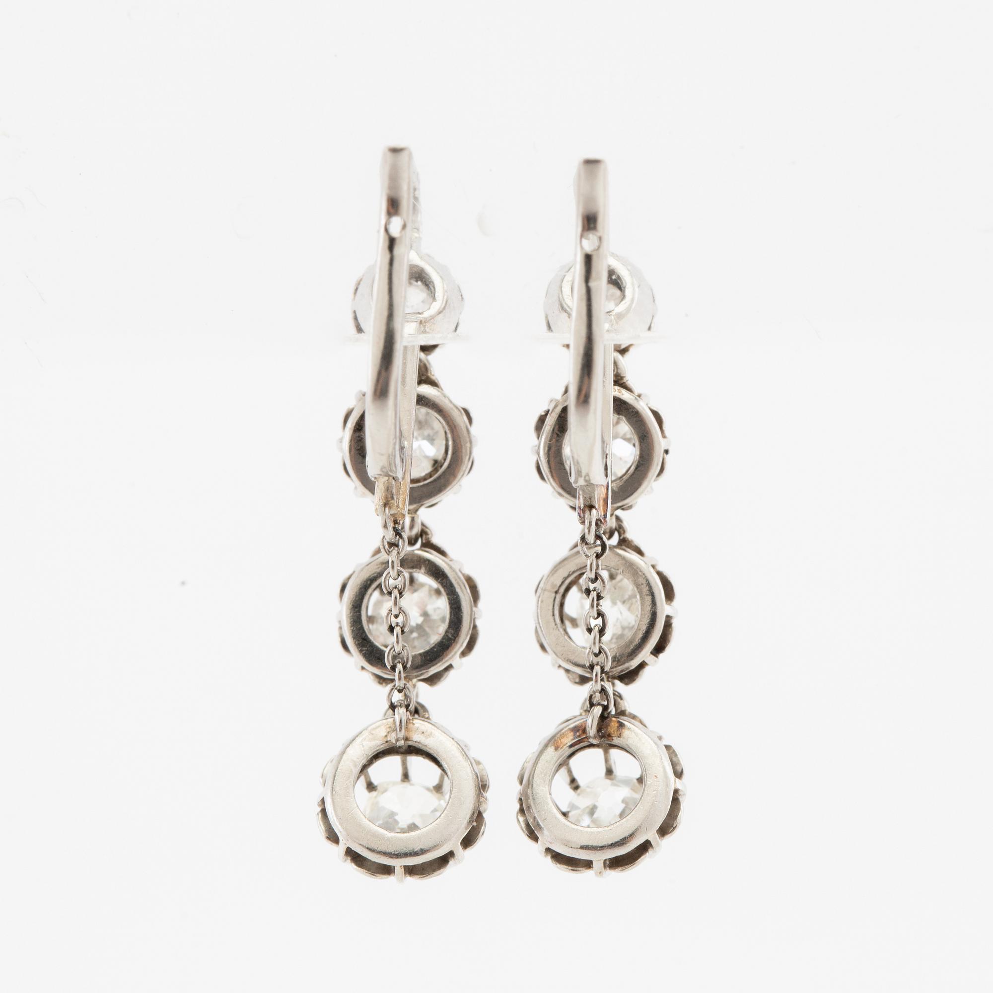 Earrings, a pair of 950 platinum set with old-cut diamonds.