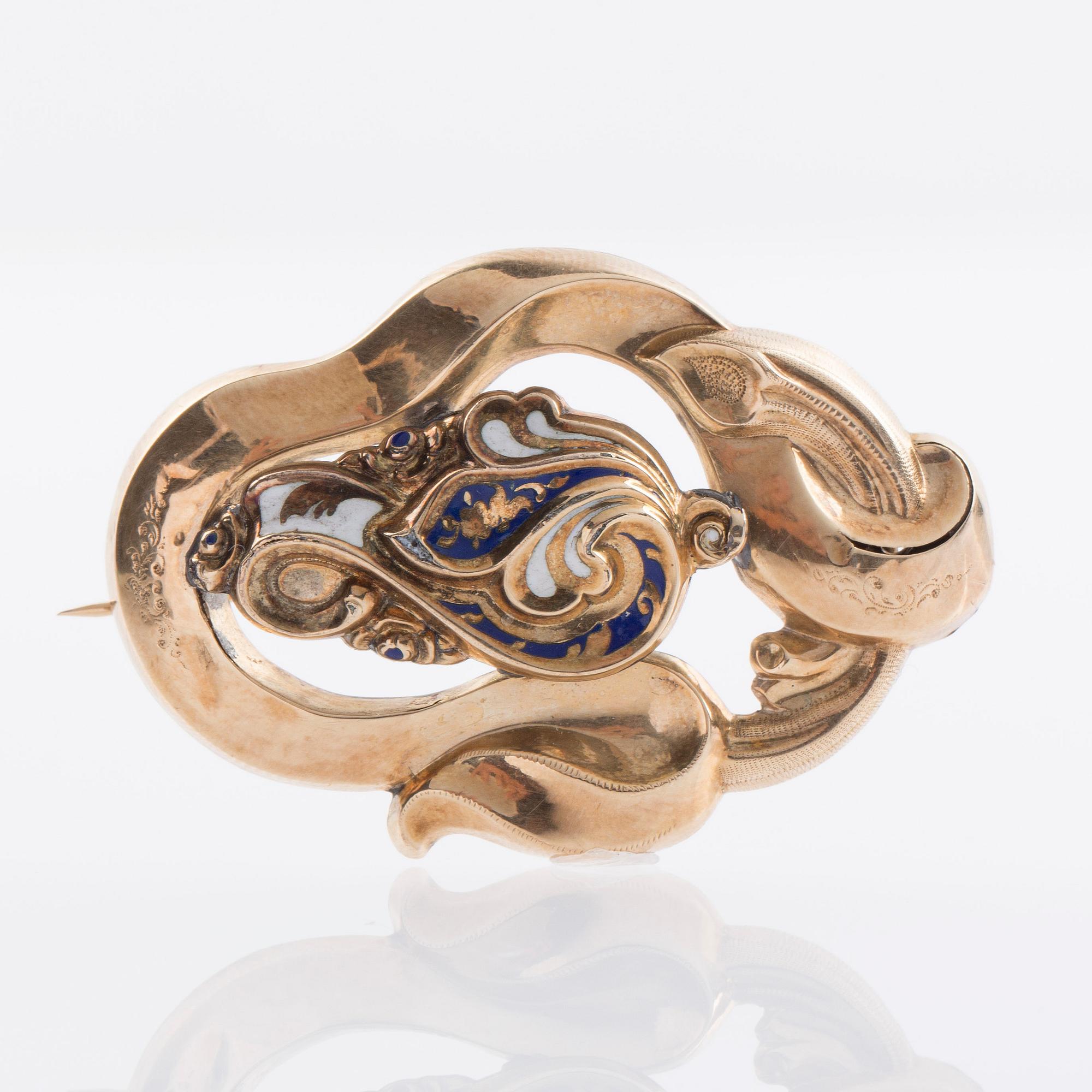 BROSCH, 8K guld med vit och blå emalj, 1800/1900 tal.