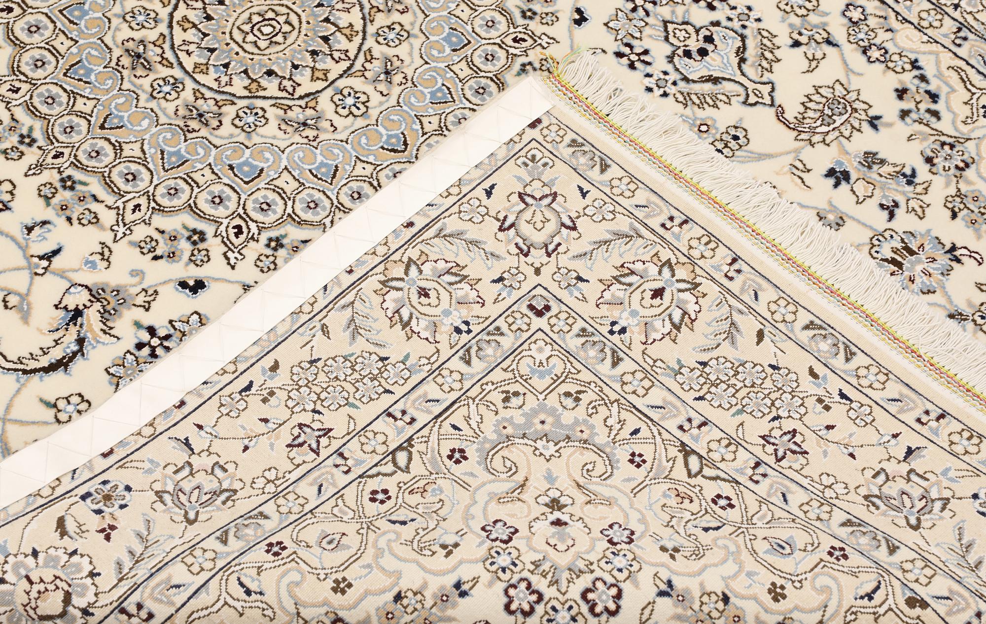 A Nain rug, part silk, so-called 9LAA, c. 210 x 130 cm.