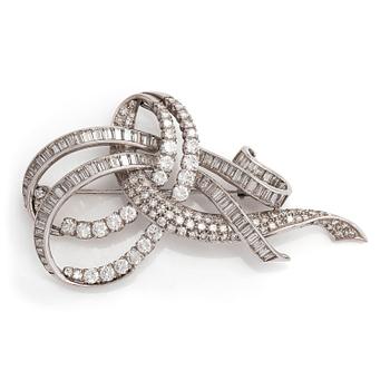 A platinum brooch, set with brilliant, baguette and eight-cut diamonds totalling approx. 7.21 ct. With certificate.