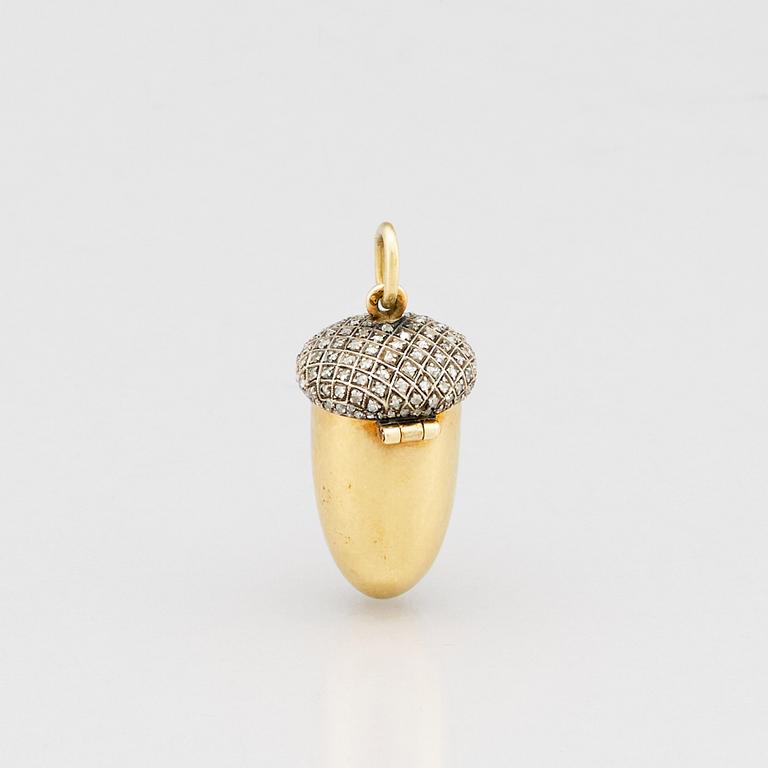 A jeweled gold pendant locker, with a cigarette holder, St. Petersburg 1908-1917.