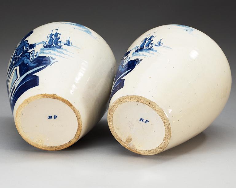 A pair of Dutch fainece tobacco jars, 18th Century.