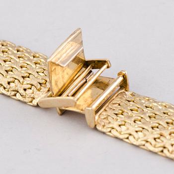 GULDLÄNK för ARMBANDSUR, 20 mm, 14K guld. Helsingfors 1969.