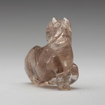 A quartz carving of a reclining horse, China.