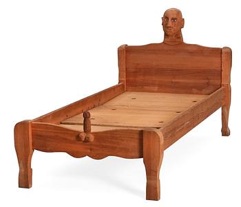 An Erik Höglund wooden bed, signed and dated 1969.