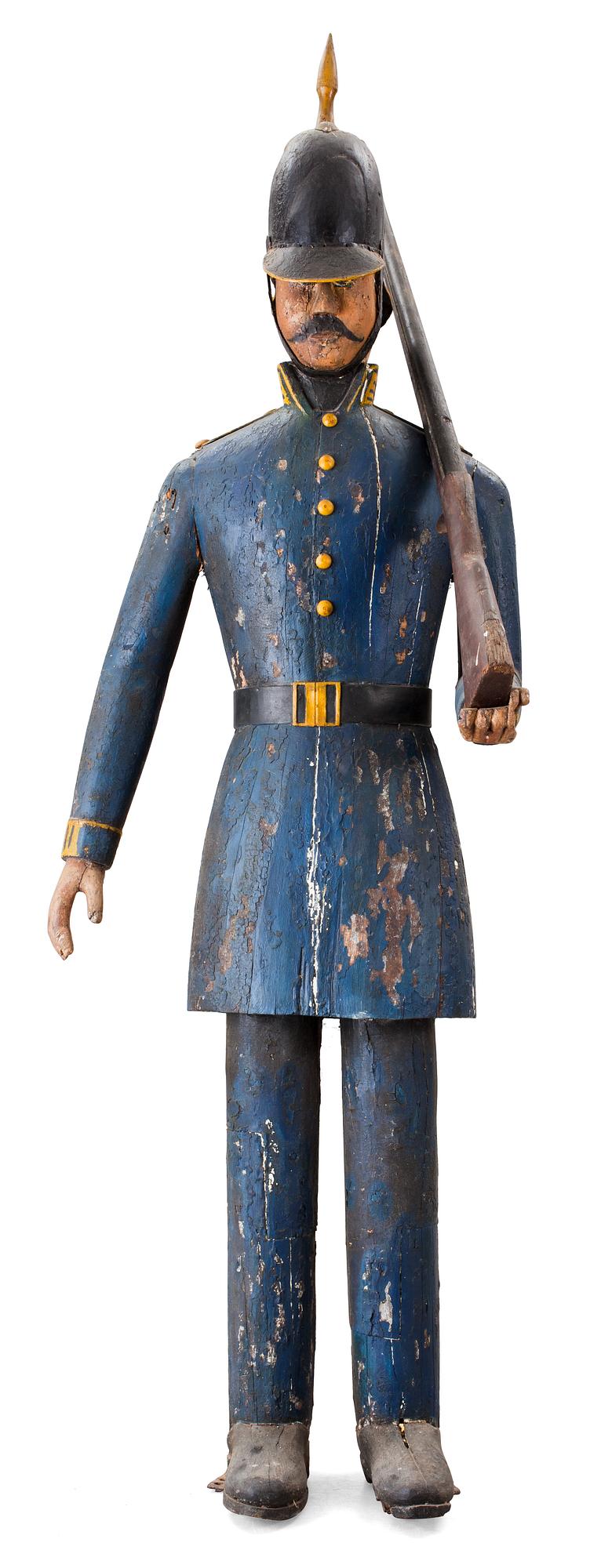 A Swedish 19th Century wooden sculpture.