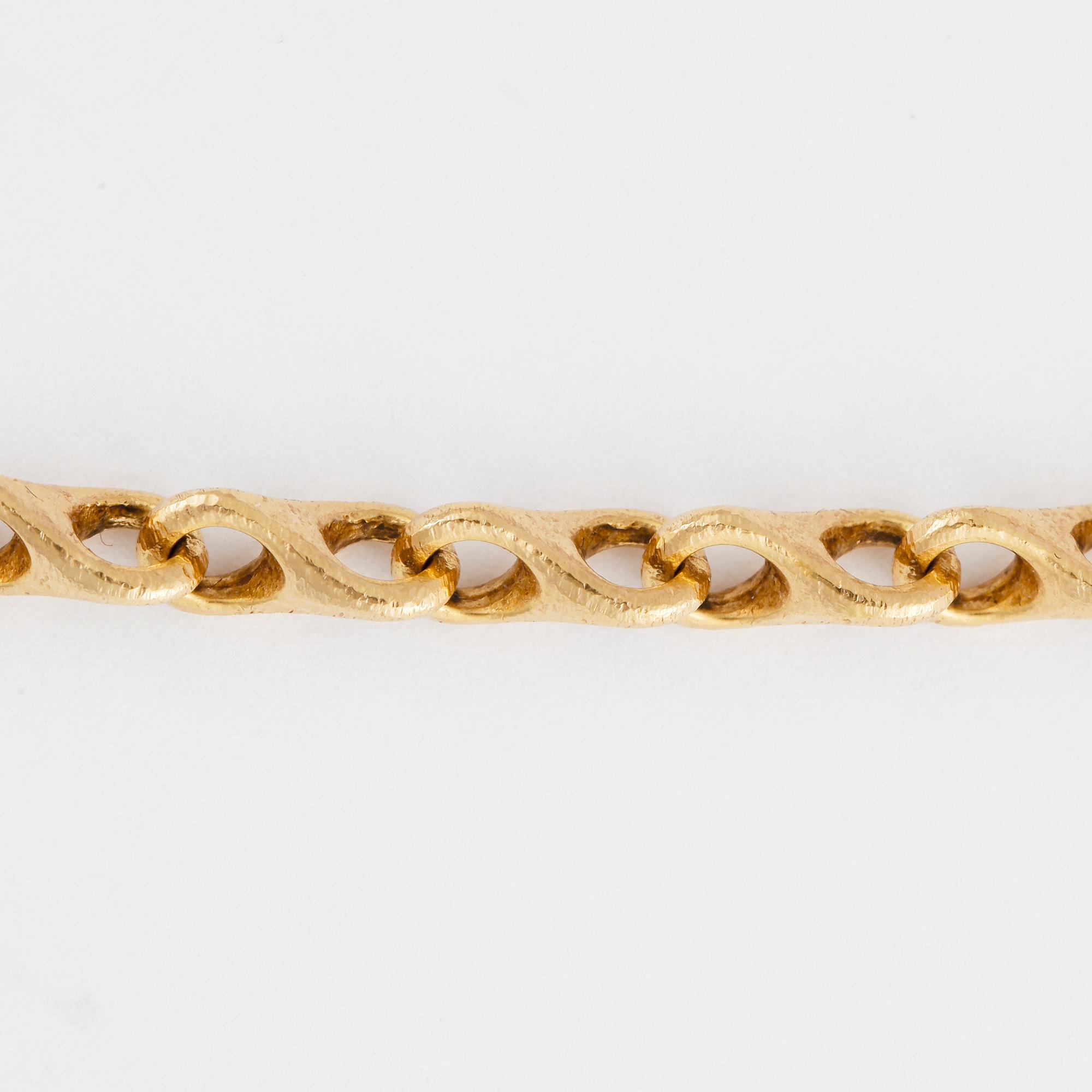 HALSSMYCKE, Ole  Lynggaard, 18k guld med briljantslipad diamant ca0,07ct. Totalvikt 43,5g.