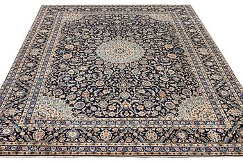 A Keshan carpet, c. 392 x 290 cm.
