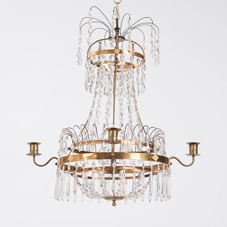 A late Gustavian four-light chandelier, early 19th century.