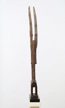 HEADDRESS. Tshiwara/Ciwara (stylized male antelope). Wooden sculpture with metal fittings.