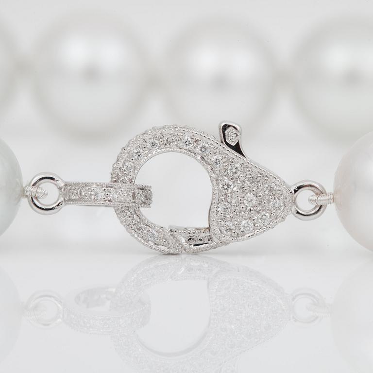 A cultured South Sea pearl necklace, Ø 12-14 mm, with a diamond-set clasp.