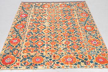 An embroidery, an antique suzani, ca 230 x 169 cm.