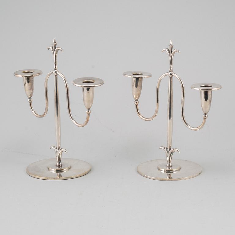 a pair of Elis Bergh silver plated candelabras, Swedish grace, CG Hallberg, Stockholm, 1920s.