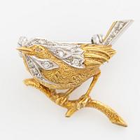 Brooch in the form of a bird, 18K gold with eight-cut diamonds.