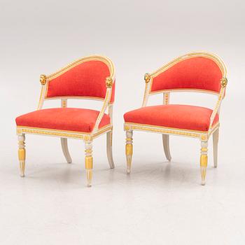 A pair of late Gustavian-style open armchairs, first part 19th century and circa 1900.