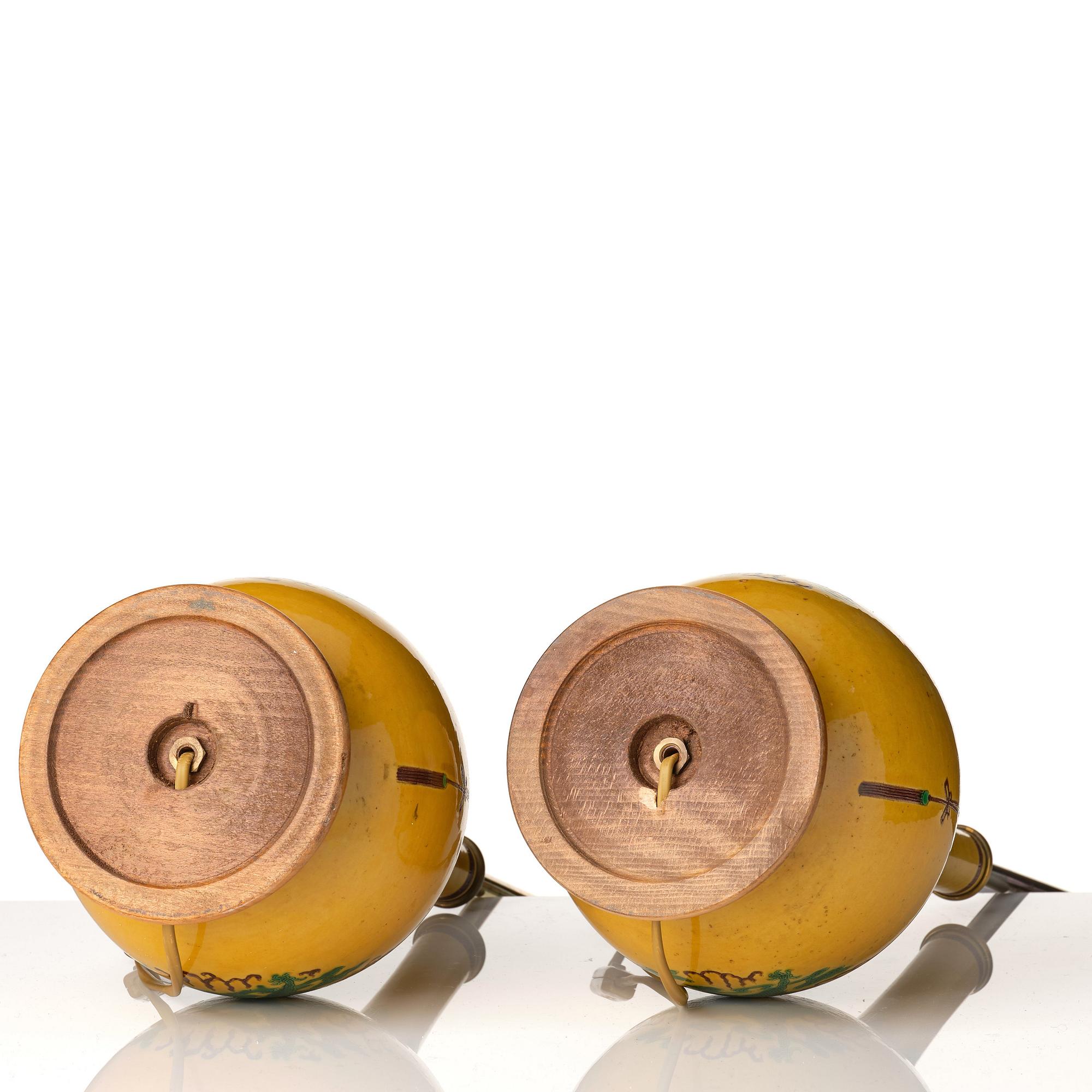 A pair of late yellow ground vases with five clawed dragons, late Qing dynasty.